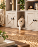 Cat walking through the center passage of the farmhouse-style double litter box enclosure